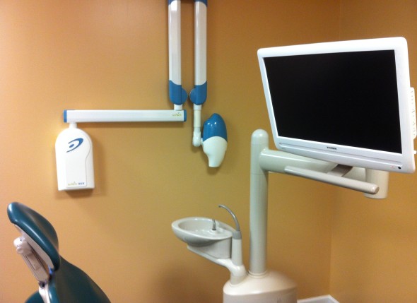 Monitor and patient chair at LaClair Family Dental